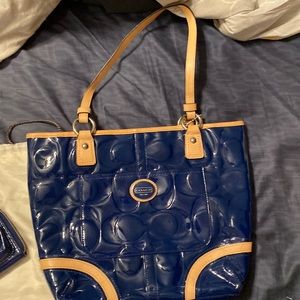 navy and tan coach bag with wristlet and original dust bag
